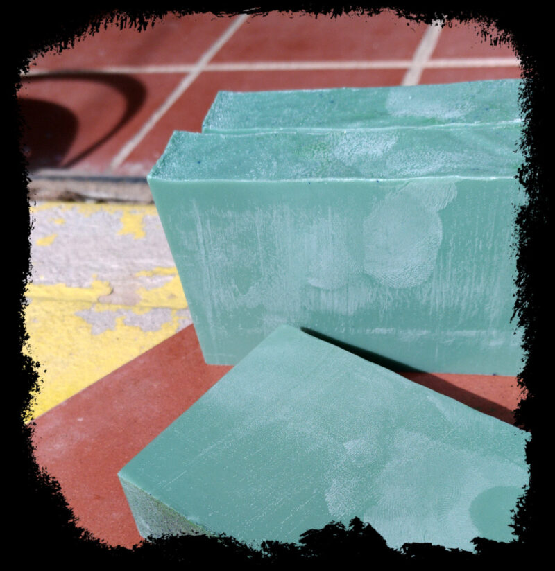 three bars of blue-green soap