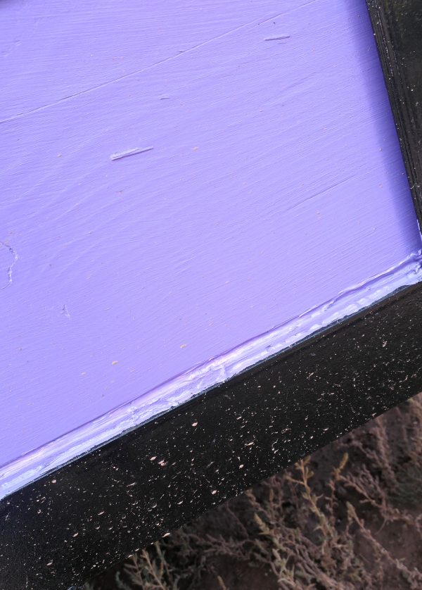 There's still two boards & a line of caulk, but it's all been painted purple now.