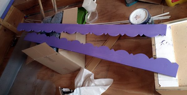 Both pieces of trim have been painted the same dark purple I've used on the door & the other trim.