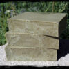 Three bars of deep forest green soap.